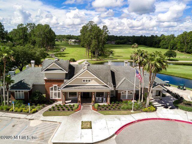 3461 Mainard Branch Ct, Fleming Island, FL 32003 - view of property featuring a water view, view of golf course, and view of wooded area