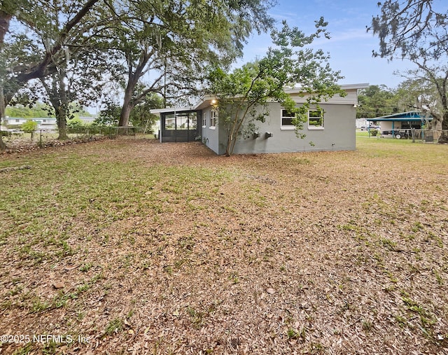 8636 Bermuda Rd, Jacksonville, FL 32208 - view of yard with a sunroom