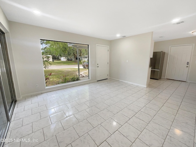 8636 Bermuda Rd, Jacksonville, FL 32208 - unfurnished room with baseboards and recessed lighting