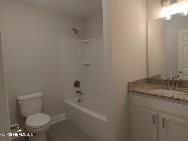 2985 Vianey Pl, Green Cove Springs, FL 32043 - full bathroom with tile patterned floors, toilet, vanity,  shower combination, and baseboards