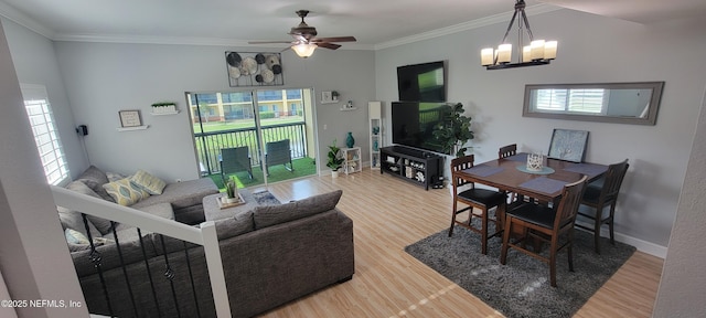 9745 Touchton Rd Unit 1521, Jacksonville, FL 32246 - living area featuring ornamental molding, wood finished floors, a chandelier, a ceiling fan, and baseboards