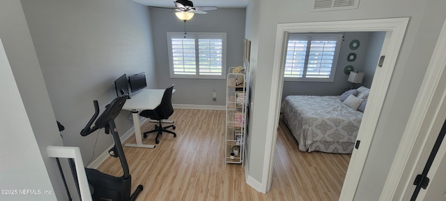 9745 Touchton Rd Unit 1521, Jacksonville, FL 32246 - bedroom with light wood-style floors and baseboards