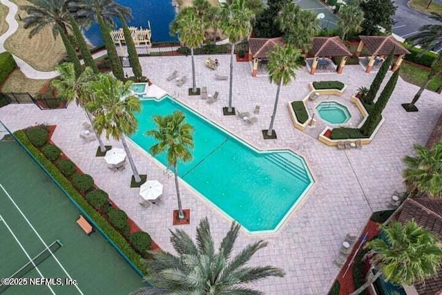 9745 Touchton Rd Unit 1521, Jacksonville, FL 32246 - community pool featuring a hot tub, a gazebo, and a patio area