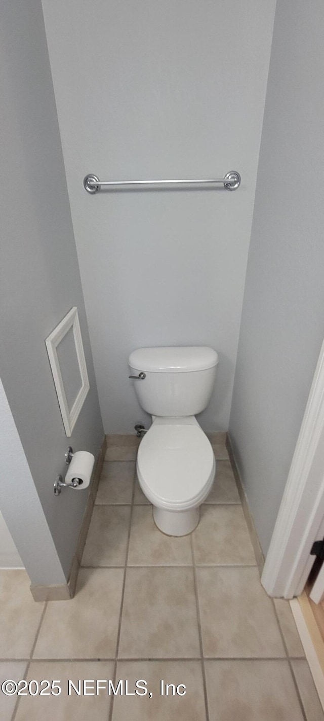 9745 Touchton Rd Unit 1521, Jacksonville, FL 32246 - bathroom with toilet and tile patterned floors