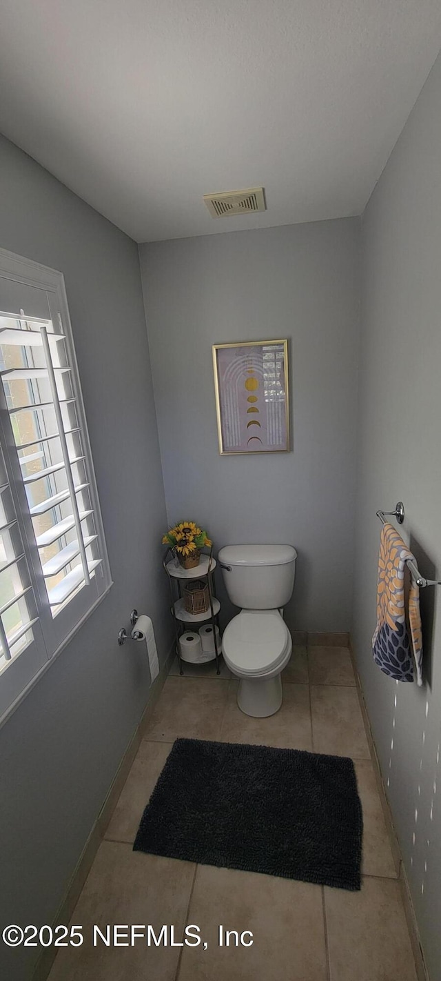 9745 Touchton Rd Unit 1521, Jacksonville, FL 32246 - bathroom with toilet and tile patterned flooring