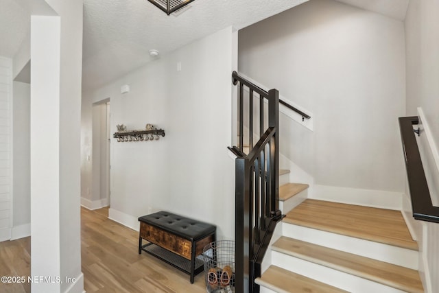 102 Blue Oak Ct, Ponte Vedra, FL 32081 - stairs featuring wood finished floors and baseboards