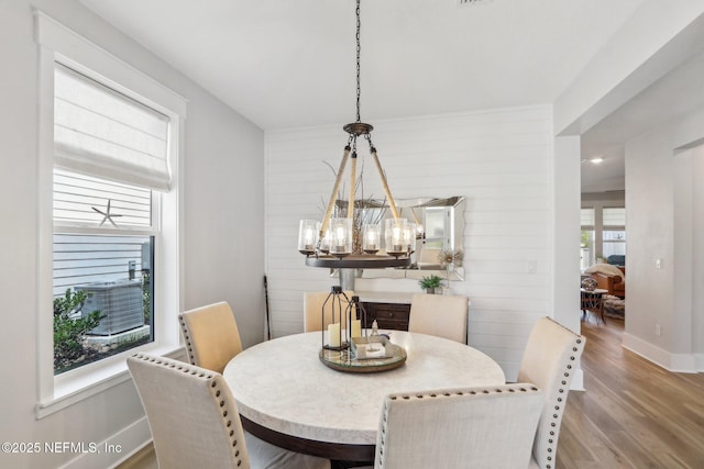 102 Blue Oak Ct, Ponte Vedra, FL 32081 - dining space with a chandelier, wood finished floors, and baseboards