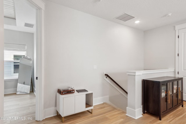 102 Blue Oak Ct, Ponte Vedra, FL 32081 - hallway with an upstairs landing, light wood-style floors, baseboards, and recessed lighting