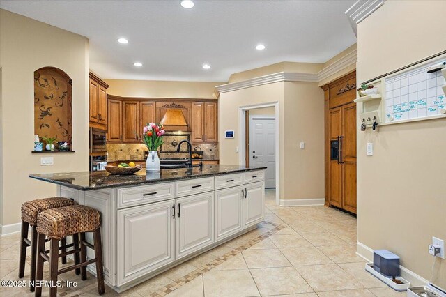 3355 Bishop Estates Rd, Saint Johns, FL 32259 - kitchen with appliances with stainless steel finishes, tasteful backsplash, light tile patterned floors, baseboards, and recessed lighting