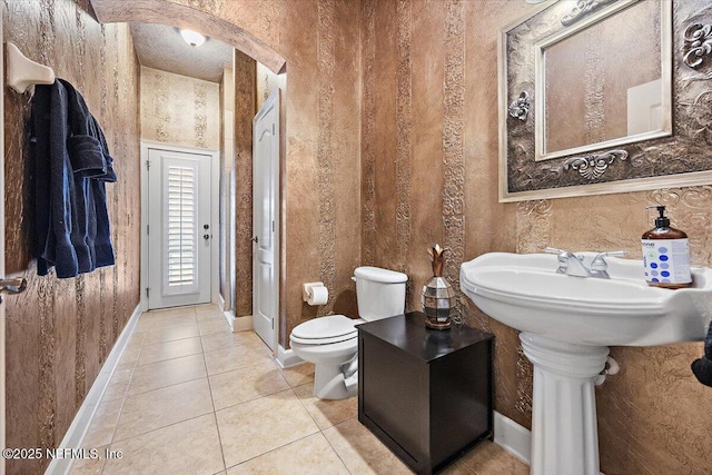 3355 Bishop Estates Rd, Saint Johns, FL 32259 - bathroom featuring tile patterned flooring, toilet, and baseboards