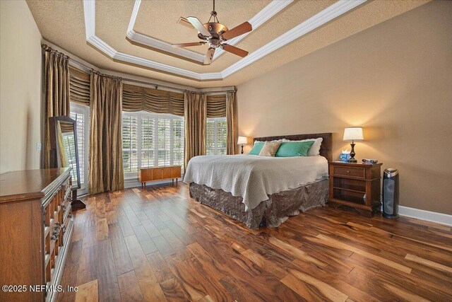 3355 Bishop Estates Rd, Saint Johns, FL 32259 - bedroom featuring a raised ceiling, wood-type flooring, crown molding, baseboards, and a ceiling fan