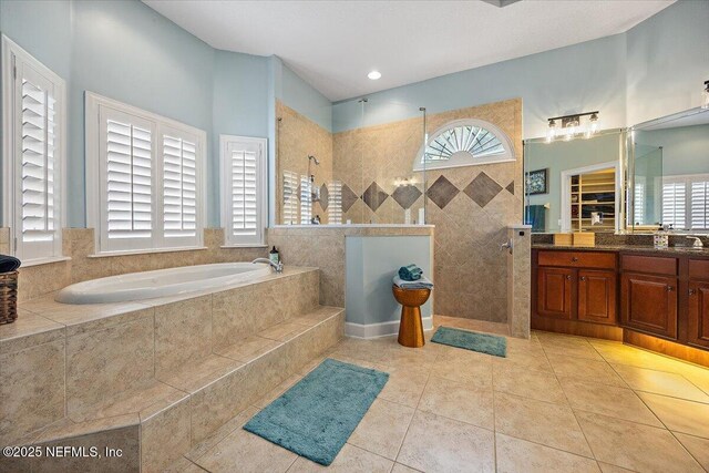 3355 Bishop Estates Rd, Saint Johns, FL 32259 - full bath with walk in shower, a bath, vanity, and tile patterned floors