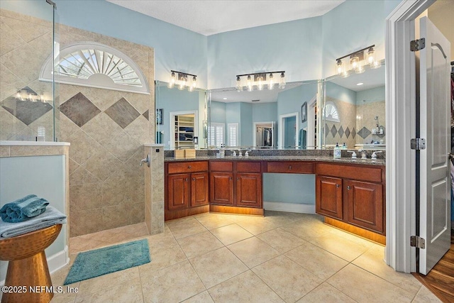 3355 Bishop Estates Rd, Saint Johns, FL 32259 - bathroom featuring a walk in shower, double vanity, and tile patterned floors