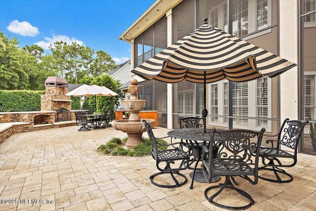 3355 Bishop Estates Rd, Saint Johns, FL 32259 - view of patio with an outdoor stone fireplace and outdoor dining area
