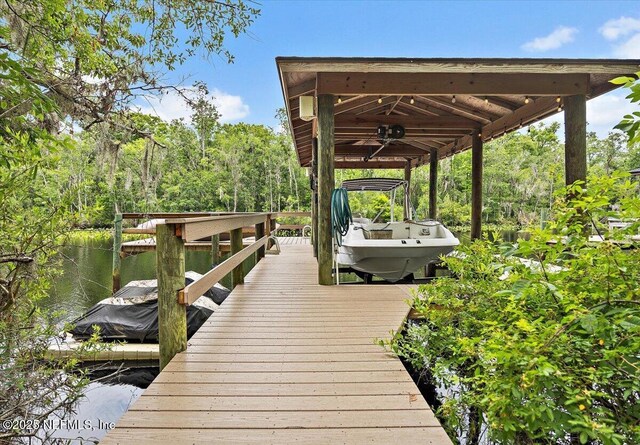 3355 Bishop Estates Rd, Saint Johns, FL 32259 - dock with boat lift and a water view
