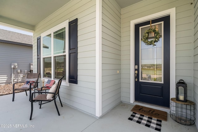 property entrance featuring a porch