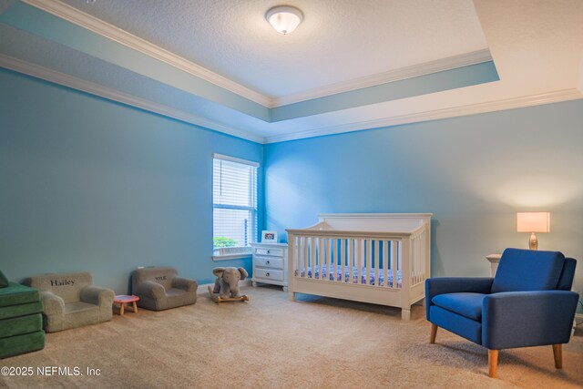 310 Cedarstone Way, Saint Augustine, FL 32092 - carpeted bedroom with ornamental molding, a crib, and a textured ceiling