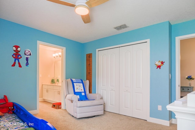 310 Cedarstone Way, Saint Augustine, FL 32092 - bedroom with carpet, a closet, baseboards, and ensuite bathroom