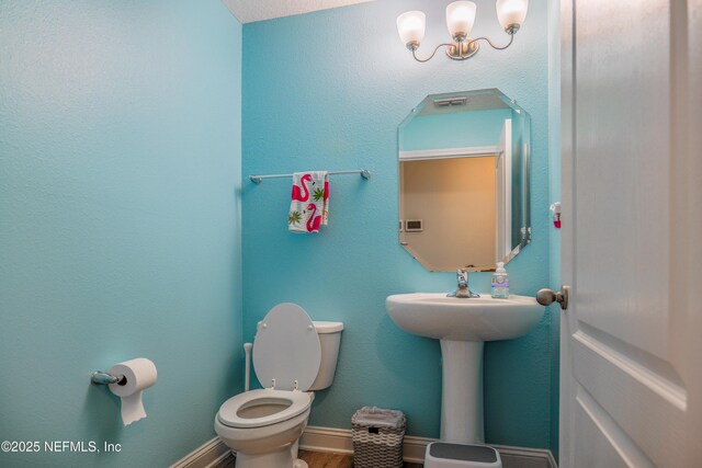 310 Cedarstone Way, Saint Augustine, FL 32092 - half bath featuring toilet and wood finished floors
