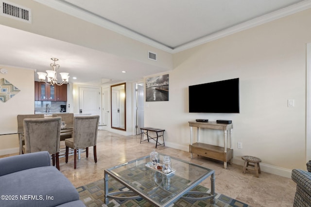 278 Sandcastles Ct, Fernandina Beach, FL 32034 - living area featuring crown molding, a chandelier, baseboards, and recessed lighting