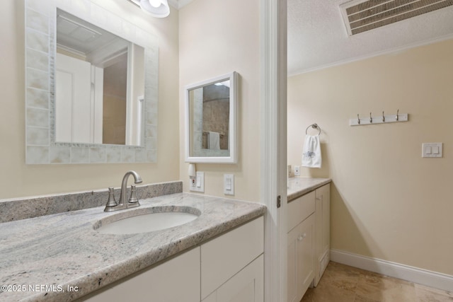 278 Sandcastles Ct, Fernandina Beach, FL 32034 - bathroom featuring vanity, ornamental molding, baseboards, and tile patterned flooring
