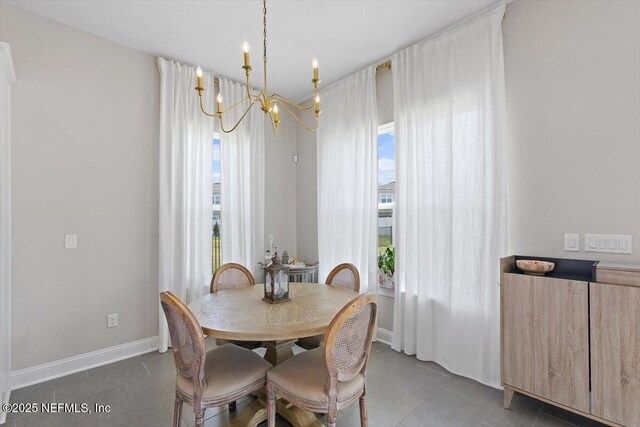 45 Waterwheel Ct, Saint Johns, FL 32259 - tiled dining space featuring a chandelier and baseboards