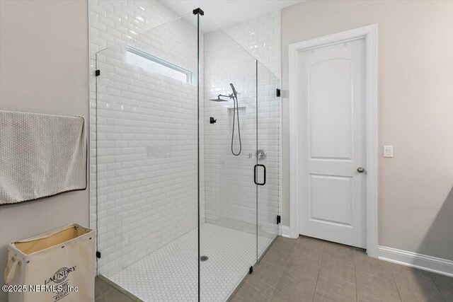 45 Waterwheel Ct, Saint Johns, FL 32259 - full bathroom with a stall shower, baseboards, and tile patterned floors