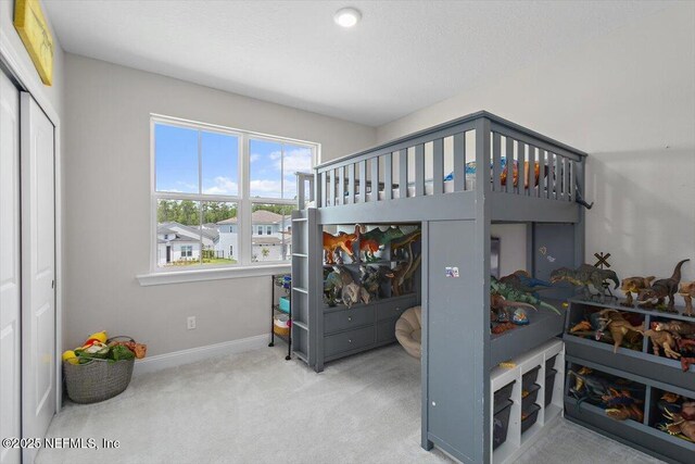 45 Waterwheel Ct, Saint Johns, FL 32259 - carpeted bedroom with baseboards and a closet