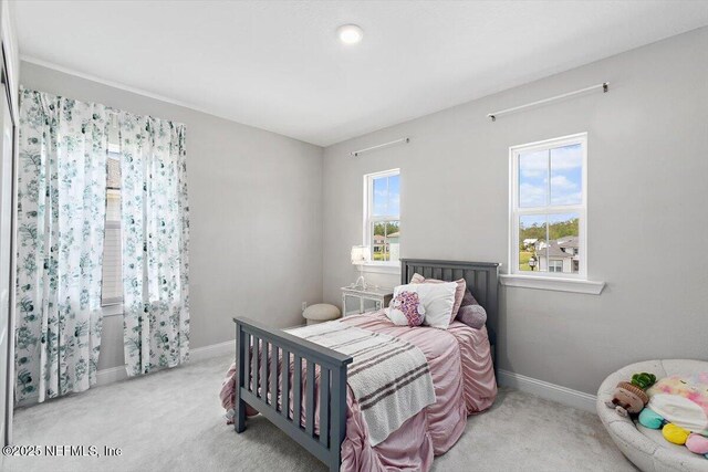 45 Waterwheel Ct, Saint Johns, FL 32259 - carpeted bedroom with baseboards