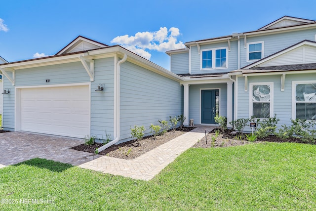 144 Waverly Way, Saint Johns, FL 32259 - view of front of property with an attached garage, a front yard, and driveway