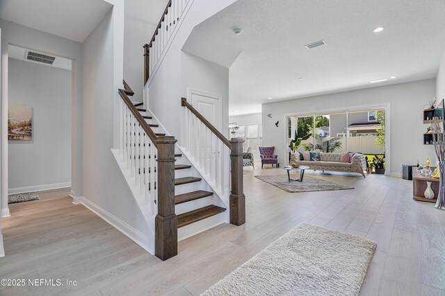144 Waverly Way, Saint Johns, FL 32259 - stairs featuring wood finished floors, baseboards, and recessed lighting