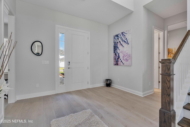 144 Waverly Way, Saint Johns, FL 32259 - foyer entrance with stairs, light wood-style floors, and baseboards
