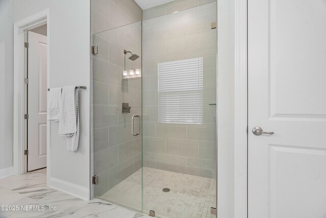 144 Waverly Way, Saint Johns, FL 32259 - full bathroom featuring a shower stall, marble look tile flooring, and baseboards