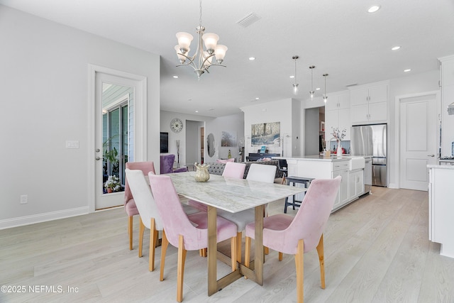 144 Waverly Way, Saint Johns, FL 32259 - dining area featuring light wood-style flooring, recessed lighting, a chandelier, and baseboards