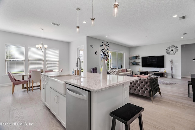 144 Waverly Way, Saint Johns, FL 32259 - kitchen with dishwasher, a sink, a textured ceiling, a chandelier, and recessed lighting