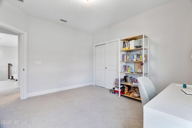 144 Waverly Way, Saint Johns, FL 32259 - office space with light colored carpet, baseboards, and a textured ceiling
