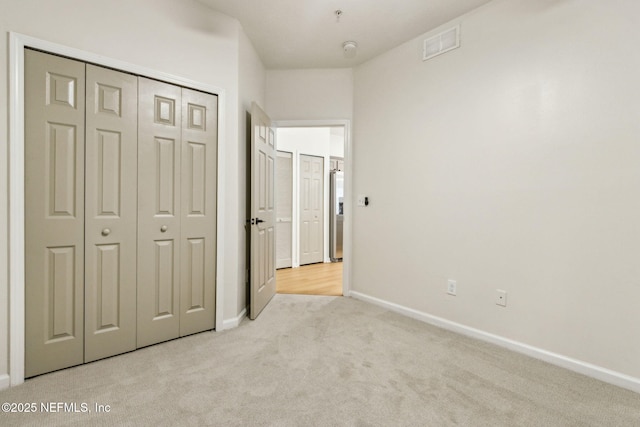 2330 Golden Lake Loop, Saint Augustine, FL 32084 - unfurnished bedroom with carpet, baseboards, and a closet