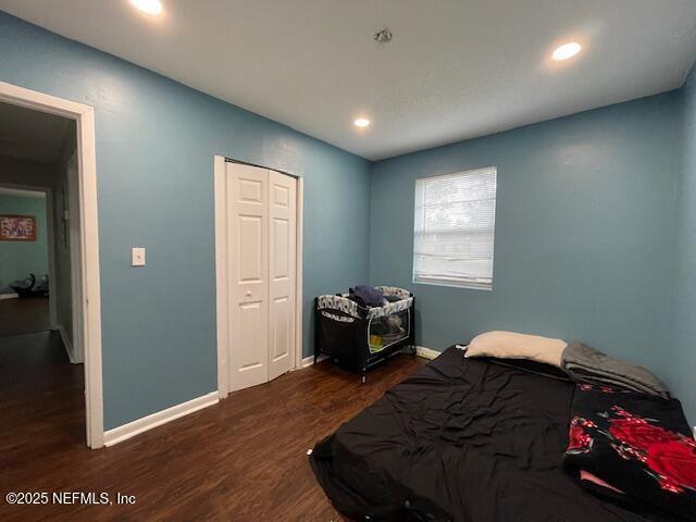 10566 Arendal Rd, Jacksonville, FL 32218 - bedroom with dark wood-style floors, recessed lighting, baseboards, and a closet