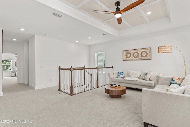 living room with light colored carpet, ceiling fan, recessed lighting, and baseboards