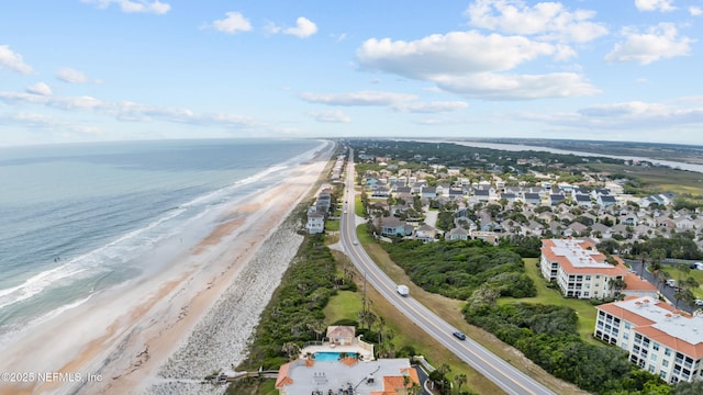 bird's eye view of waterfront with a beach