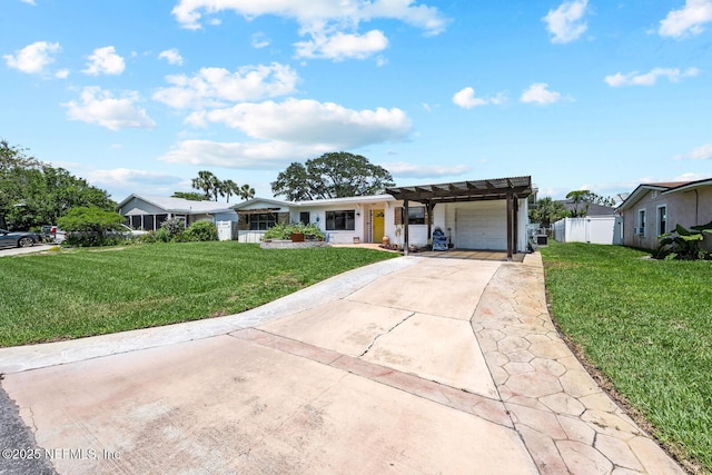 ranch-style house featuring an attached garage and concrete driveway