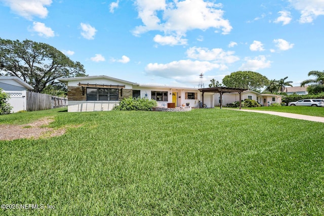 single story home with a pergola, a garage, and driveway