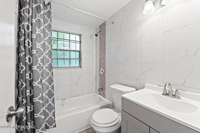 4504 Lincrest Dr S, Jacksonville, FL 32208 - full bathroom with tile walls, toilet, shower / bathtub combination with curtain, a textured ceiling, and vanity