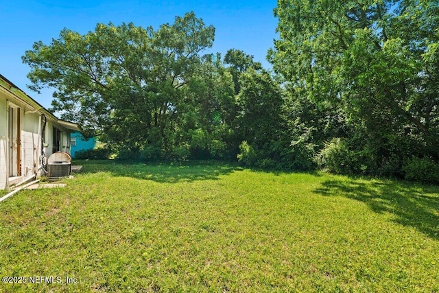 4504 Lincrest Dr S, Jacksonville, FL 32208 - view of green lawn with central air condition unit