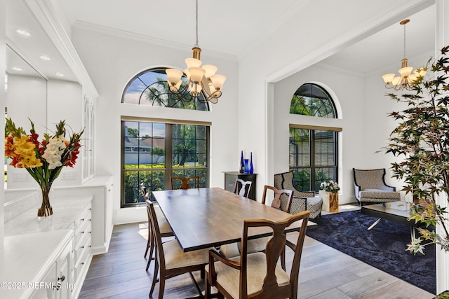 108 Spanish Moss Ln, Ponte Vedra Beach, FL 32082 - dining area with a chandelier, plenty of natural light, ornamental molding, wood finished floors, and recessed lighting