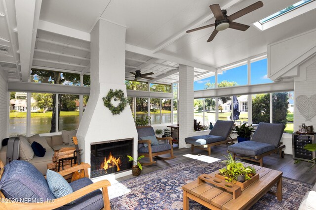 108 Spanish Moss Ln, Ponte Vedra Beach, FL 32082 - sunroom / solarium with ceiling fan, wood finished floors, and a fireplace