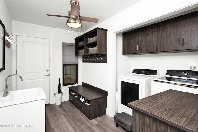 108 Spanish Moss Ln, Ponte Vedra Beach, FL 32082 - laundry area featuring cabinet space, washer and dryer, dark wood-style flooring, and a ceiling fan