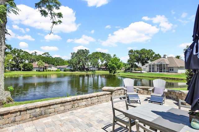 108 Spanish Moss Ln, Ponte Vedra Beach, FL 32082 - view of patio with a water view and an outdoor fire pit