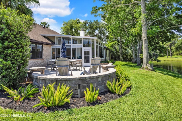 108 Spanish Moss Ln, Ponte Vedra Beach, FL 32082 - view of grassy yard with a patio area and a sunroom