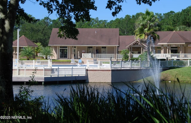 108 Spanish Moss Ln, Ponte Vedra Beach, FL 32082 - back of house featuring a water view and an outdoor pool
